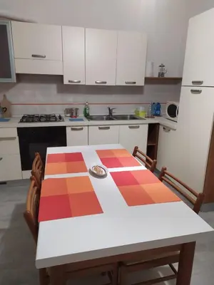 Cucina o angolo cottura di Il Giardino dei Ciliegi appartamento con 3 camere