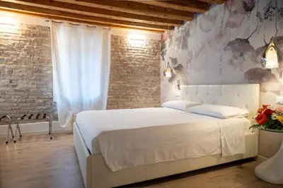 Letto o letti in una camera di Hermes Venice