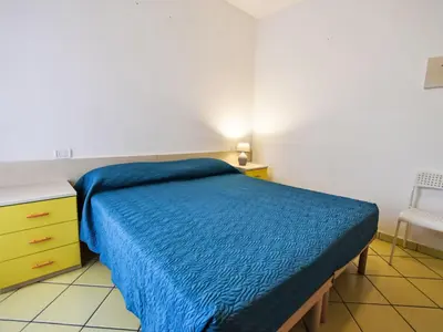 Letto o letti in una camera di Apartment Solmare-52 by Interhome