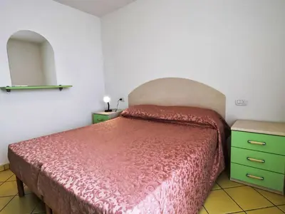 Letto o letti in una camera di Apartment Solmare-53 by Interhome