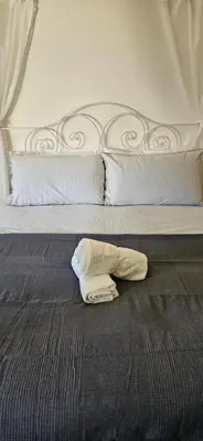 Letto o letti in una camera di Ca' Isabella