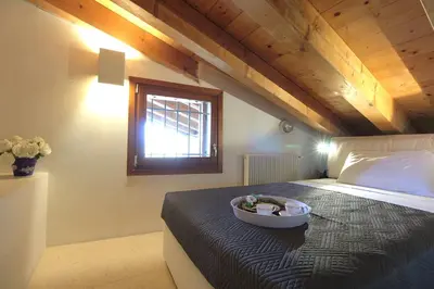 Letto o letti in una camera di Silea Apartments, Pool, Garden, Treviso