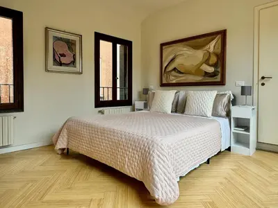Letto o letti in una camera di Terrazzi su Piazza San Marco