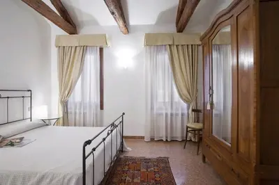 Letto o letti in una camera di Simeone IV Grande - LOCAPPART