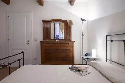 Letto o letti in una camera di Simeone IV Grande - LOCAPPART