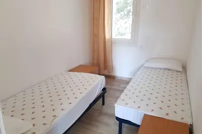 Letto o letti in una camera di Dalila