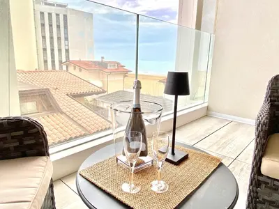 Area soggiorno di Tahiti Suite Frontemare - Jesolo - FAMILY APARTMENT