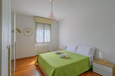 Letto o letti in una camera di LA MAR Apartment Viareggio