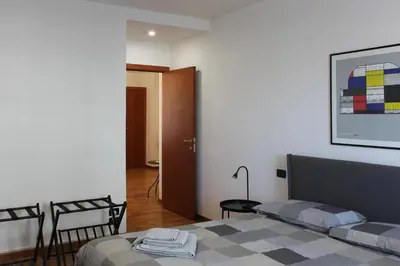 Letto o letti in una camera di La Basilica Luxury Apartment - Close to the City Center and Fiera di Vicenza