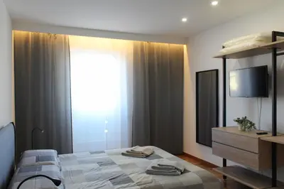 TV o dispositivi per l'intrattenimento presso La Basilica Luxury Apartment - Close to the City Center and Fiera di Vicenza