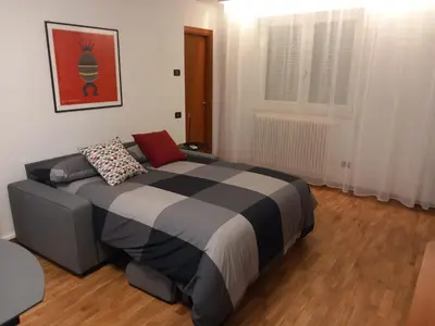 Letto o letti in una camera di La Basilica Luxury Apartment - Close to the City Center and Fiera di Vicenza
