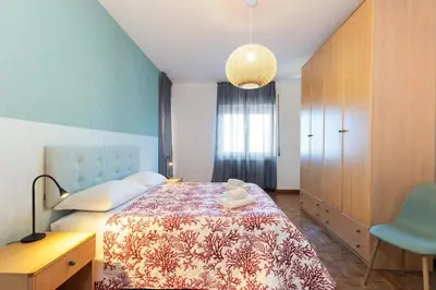 Letto o letti in una camera di Signorile appartamento in Mestre 1 Min from Tram to Venice