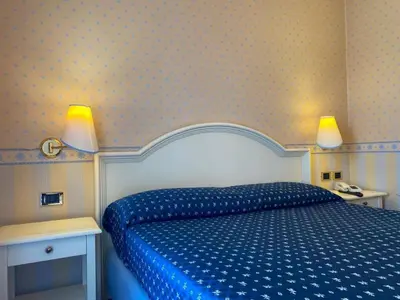 Letto o letti in una camera di Il Ghebo