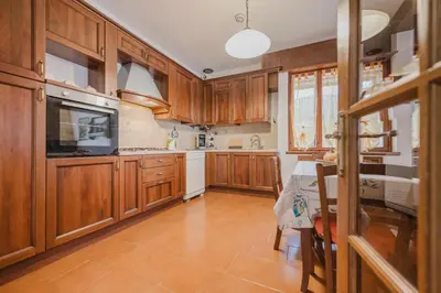 Cucina o angolo cottura di Residence Gerlin - 10 minuti da Valdobbiadene & Parking