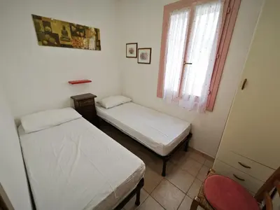 Letto o letti in una camera di Lara