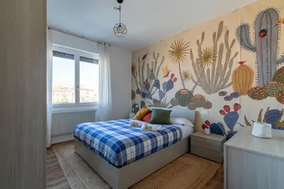 Letto o letti in una camera di Cozy Apt - Close to City Center and Train Station