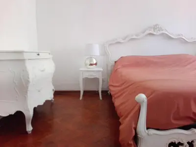 Letto o letti in una camera di Casa Martini