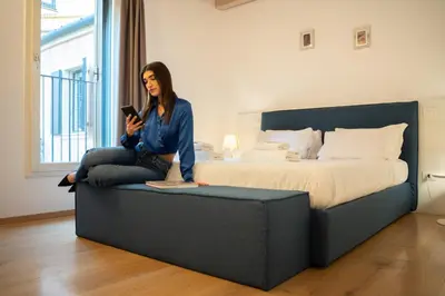 Letto o letti in una camera di Yourbanflat Piazza dei Signori 1