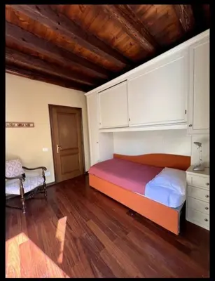 Letto o letti in una camera di Oasi di pace in centro