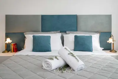 Letto o letti in una camera di B&B Villa Romano