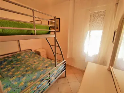 Letto o letti in una camera di RESIDENCE Park 122