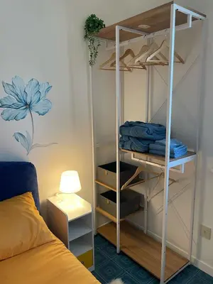 Letto o letti in una camera di tiny house appartamento x2