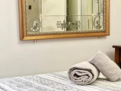 Letto o letti in una camera di Giardini Apartment