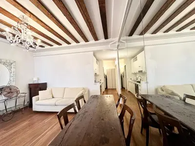 Area soggiorno di Giardini Apartment