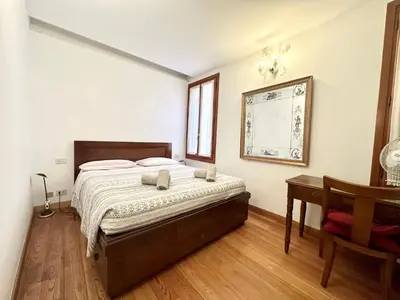 Letto o letti in una camera di Giardini Apartment