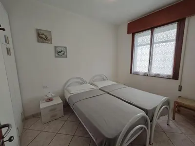 Letto o letti in una camera di Lidia