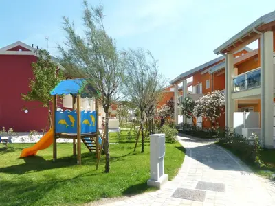 Area giochi per bambini di Apartment Green Village-4 by Interhome