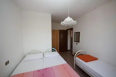 Letto o letti in una camera di Flat 150m from the beach of Rosolina