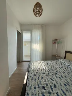Letto o letti in una camera di GREEN APARTMENT-Solo per famiglie-WALTERIGATO APARTMENTS