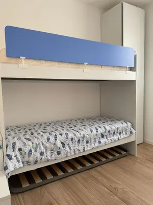Letto o letti in una camera di GREEN APARTMENT-Solo per famiglie-WALTERIGATO APARTMENTS