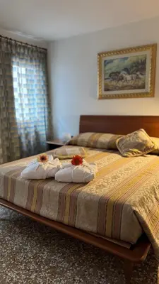 Letto o letti in una camera di Ca' Coppo