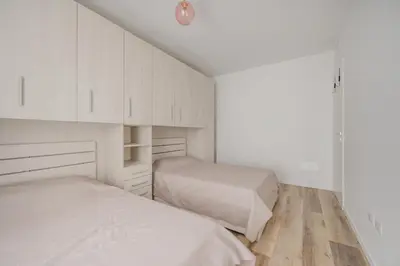 Letto o letti in una camera di Wave Island Spera B8