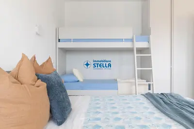 Letto o letti in una camera di Baia Dorata