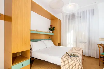 Letto o letti in una camera di Hotel Astor