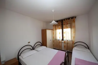 Letto o letti in una camera di Family apartment 150m from the beach