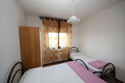 Letto o letti in una camera di Family apartment 150m from the beach