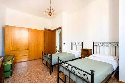 Letto o letti in una camera di Ca' Ornella by Sarlux