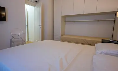 Letto o letti in una camera di Villa Oleandro Family Apartments-Leresidenzedijesolo