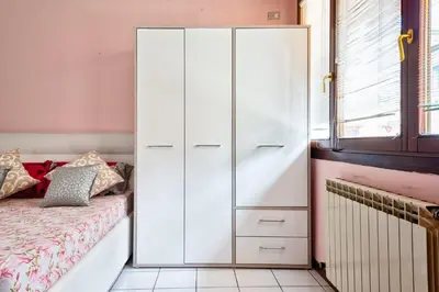 Letto o letti in una camera di Villa Jolly Venezia