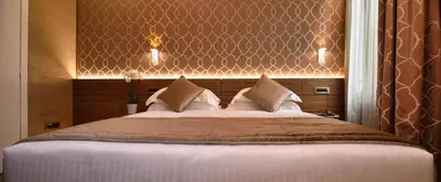 Letto o letti in una camera di Rosa Salva Hotel
