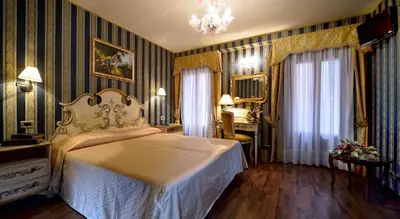 Letto o letti in una camera di Zulian P & Q & U