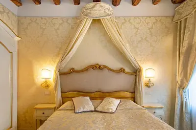 Letto o letti in una camera di B&B Patatina