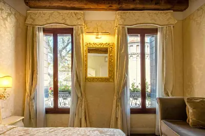 Letto o letti in una camera di B&B Patatina
