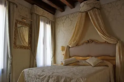 Letto o letti in una camera di B&B Patatina
