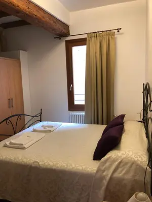 Letto o letti in una camera di Corte Contarina