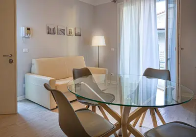 Area soggiorno di Villa Giulia Family Apartments- LeresidenzediJesolo